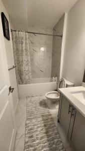 Bright & Cozy 2BR Suite Near WEM