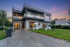 Gardenia 4-BHK Farmhouse with Private Pool, Game Zone, & Lush Garden