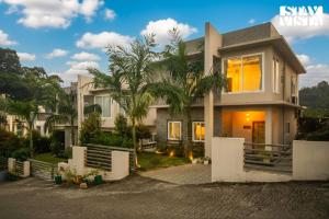 StayVista at Ohana 36 - Lawn, Gazebo & BBQ
