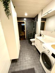 Cozy one bedroom and living room apartment with sauna and garage