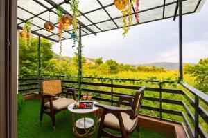 ELIVAAS Signature Shreya Blossom Retreat 4-BHK Retreat With Private Pool, Gazebo, Garden, Bar & Scenic Aravali Views