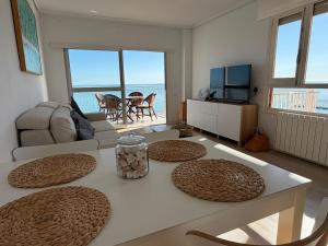 Exclusivo ático en primera línea del mar