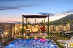 ELIVAAS Signature Shreya Blossom Retreat 4-BHK Retreat With Private Pool, Gazebo, Garden, Bar & Scenic Aravali Views