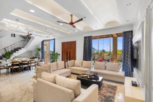 ELIVAAS Signature Shreya Blossom Retreat 4-BHK Retreat With Private Pool, Gazebo, Garden, Bar & Scenic Aravali Views