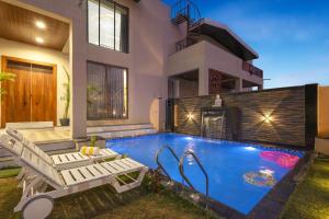 ELIVAAS Signature Shreya Blossom Retreat 4-BHK Retreat With Private Pool, Gazebo, Garden, Bar & Scenic Aravali Views