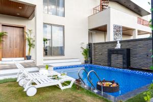 ELIVAAS Signature Shreya Blossom Retreat 4-BHK Retreat With Private Pool, Gazebo, Garden, Bar & Scenic Aravali Views