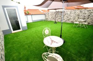 O Cantinho Guesthouse com Terraço e Vistas em Quinta do Anjo
