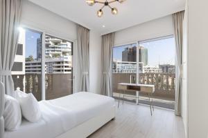 Contemporary 2BR in JVC With Pool, Gym & Relaxing Stay