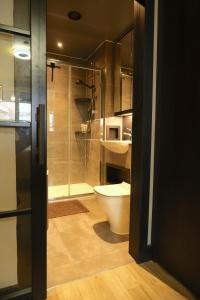 Master Bedroom, En Suite Bathroom, & shared balcony in trendy apartment