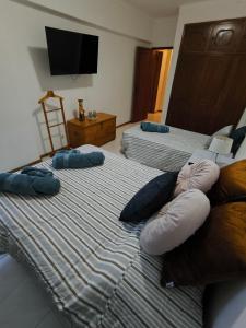 T2 Junto à praia, com lençóis, toalhas, WIFI, Churrasqueira, 3ºpiso sem elevador