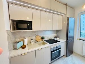 Lotus Apartments Impero oddzielna kuchnia 2 pokoje garaż