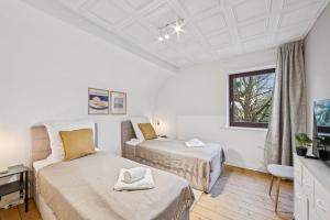 Nalia Homes - Central apartment with train station within walking distance