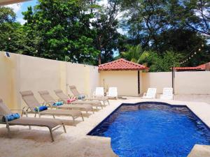 Elegant Surfside Retreat with Private Pool Spacious Outdoor Patio & Walkable Beach Access