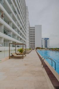 Encantador y moderno estudio con piscina a pasos del aeropuerto