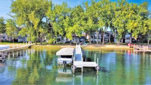 Classic West Lake Okoboji Estate w Guest House + Sand Beach