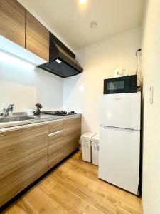 天下茶屋徒歩圏内 花園町駅徒歩3分 難波 梅田に直通 トイレと浴室付き まるまる貸切 部屋35平 203室