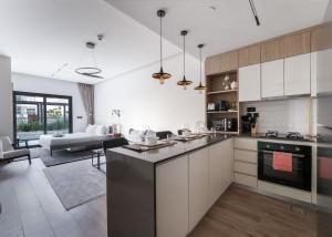 Free housekeeping visits during your stay - StayShort - JVC Apartment with Private Balcony Sleeps 4