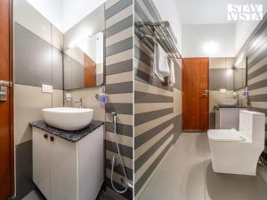 StayVista at Lagoons Kuruva with Shared Pool, Lawn