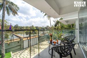 StayVista at Lagoons Kuruva with Shared Pool, Lawn