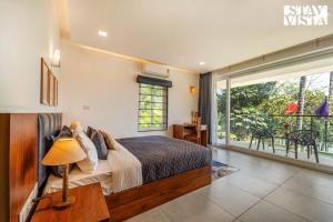 StayVista at Lagoons Kuruva with Shared Pool, Lawn