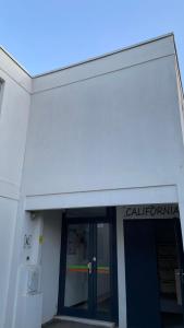 LE BOHÈME - balcon vue jardin - clim - place de parking - wifi - 5min plage