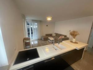 Barrierefreie Luxuswohnung mit Garten