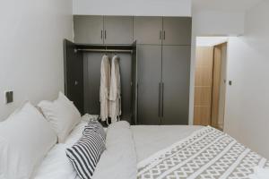 Stylish Luxury Apartment Near JKIA Airport & SGR - Pool, Free Parking & Wi-Fi