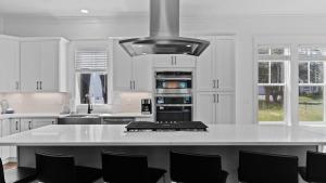 4BR Coastal Retreat w Pool Patio Games Lagniappe at Blue Mountain by AvantStay