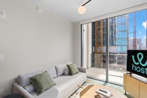 Downtown Stay with Rooftop Pool Amenities