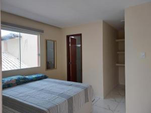 Casa espaçosa em Jauá com piscina, Wi-Fi e lazer completo