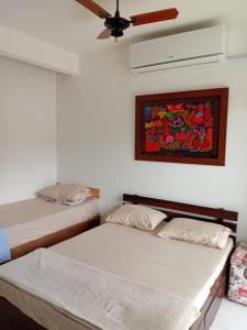 Casa com Ar Condicionado e Wifi 5G no Parque Mambucaba Na entrada do bairro