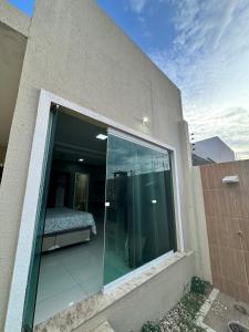 Casa completa com 3 quartos,ar e garagem