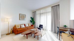 Vacationer Holiday Homes l Contemporary 2 Bedroom l Pool, Gym, Private Beach Access