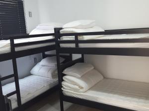Giường trong Phòng ngủ tập thể Nữ 4 Người (Bed in 4-Bed Female Dormitory Room)