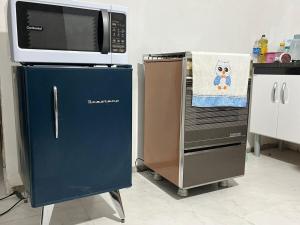 Suite com ar, cozinha, área, churrasqueira para até 4 pessoas