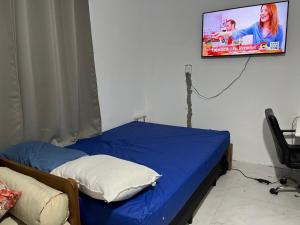 Suite com ar, cozinha, área, churrasqueira para até 4 pessoas