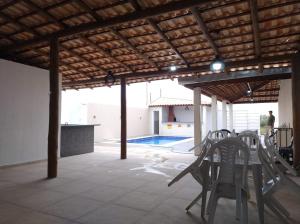 casa com piscina Espaço para laser