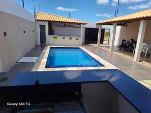 casa com piscina Espaço para laser