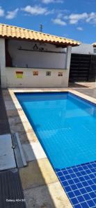 casa com piscina Espaço para laser