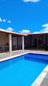 casa com piscina Espaço para laser
