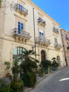 Elegante appartamento in palazzo storico Ortigia