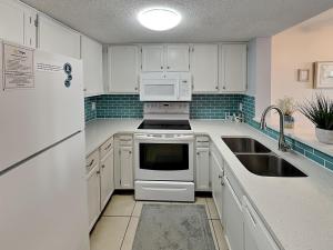 Ocean & Racquet 3107 by Distinctive Beach Rentals