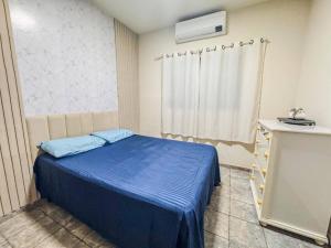 Casa espaçosa com ar em todos os quartos