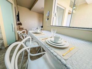 Sobrado com ar e vaga no centro de Ourinhos