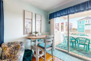 Condo near the beach with pool, BBQ area, balcony, & fireplace