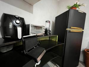 Loft D Mobiliado, individual com ar condicionado e garagem privada