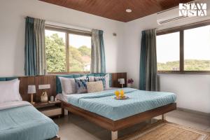 The Treetops by StayVista - 5BHK Mountain-View Cottage with Infinity Pool