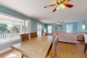 Walk to Beach | Marsh-View Escape with Screened Porch & Outdoor Shower