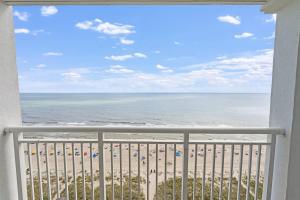 Beach condo w balcony & hot tub