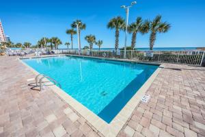 Amazing Beach Condo w hot tub, Balcony and Pools